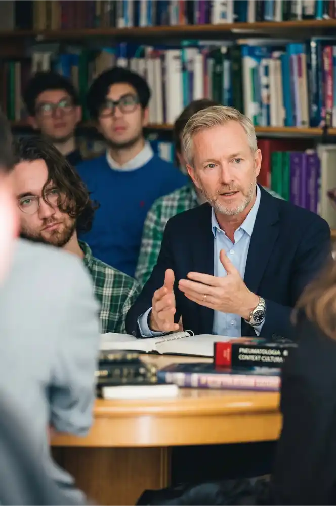 Inspired theology students deeply engaged in Master of Divinity online coursework